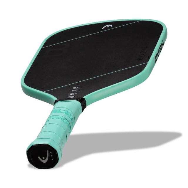 Teal pickleball paddle with black surface on a white background