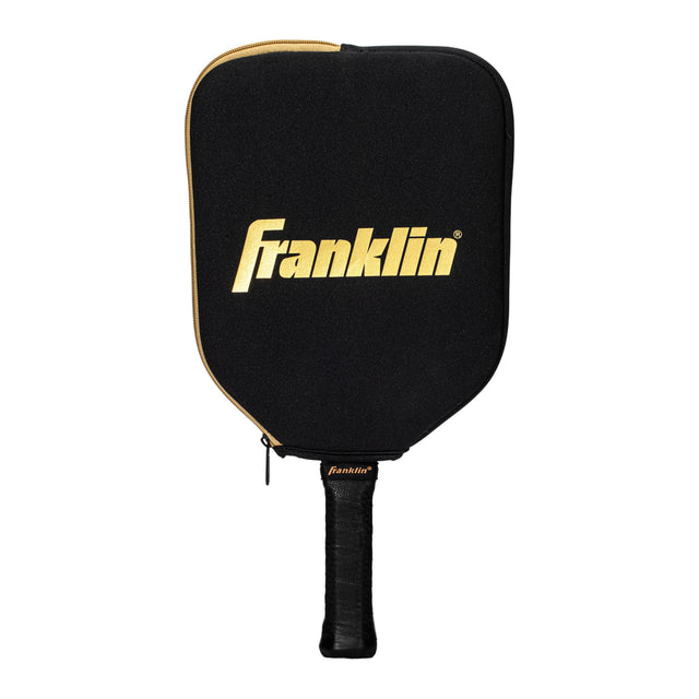 Black pickleball paddle with gold Franklin logo on a white background