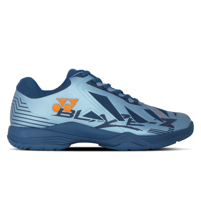 A Yonex Blaze 3 badminton shoe with a lateral shell design in crystal teal and hyper orange colors, featuring a lace-up closure and a flat sole.