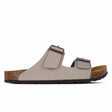 A pair of Outland Connecticut sandals in cement gray and brown colors with a microfiber upper and suede sole.