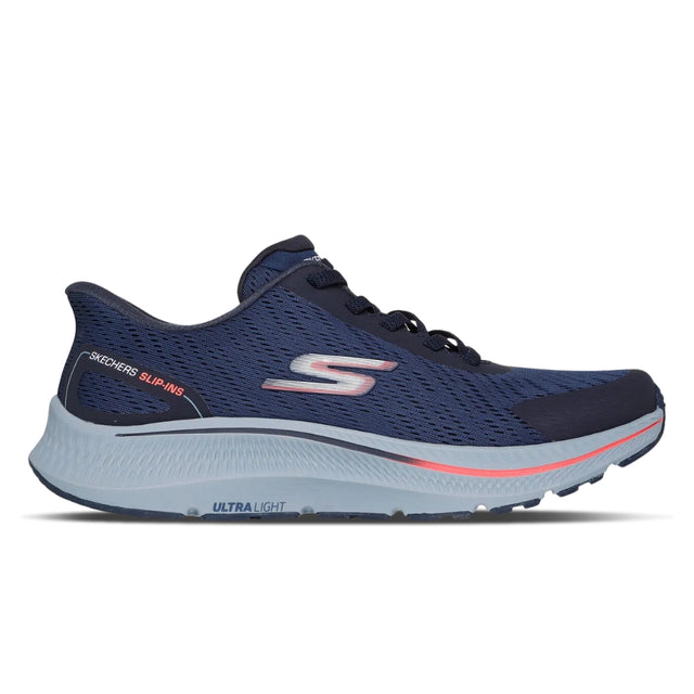 Navy running shoe with pink accents on a white background