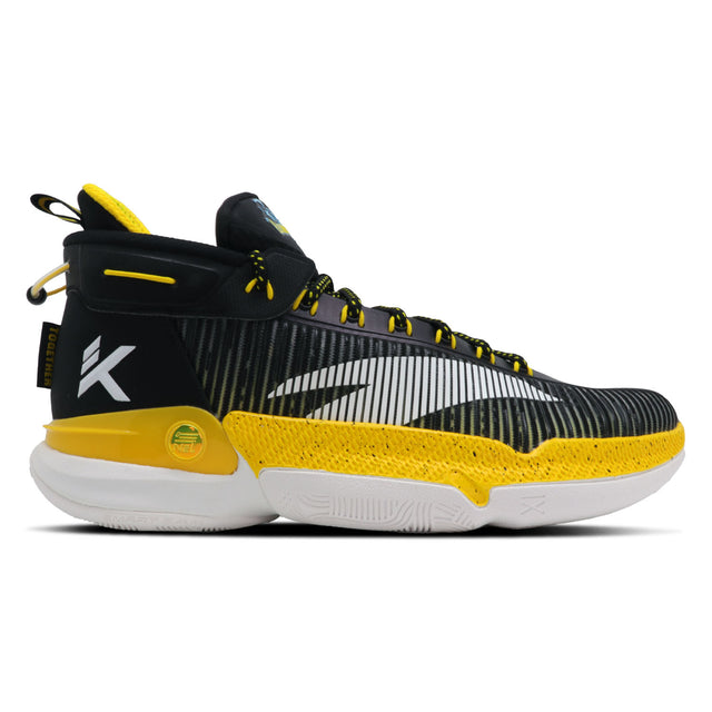 A pair of Klay Thompson Kt9 basketball shoes featuring black, yellow, and white colors with a carbon fiber plate and heel TPU frame.