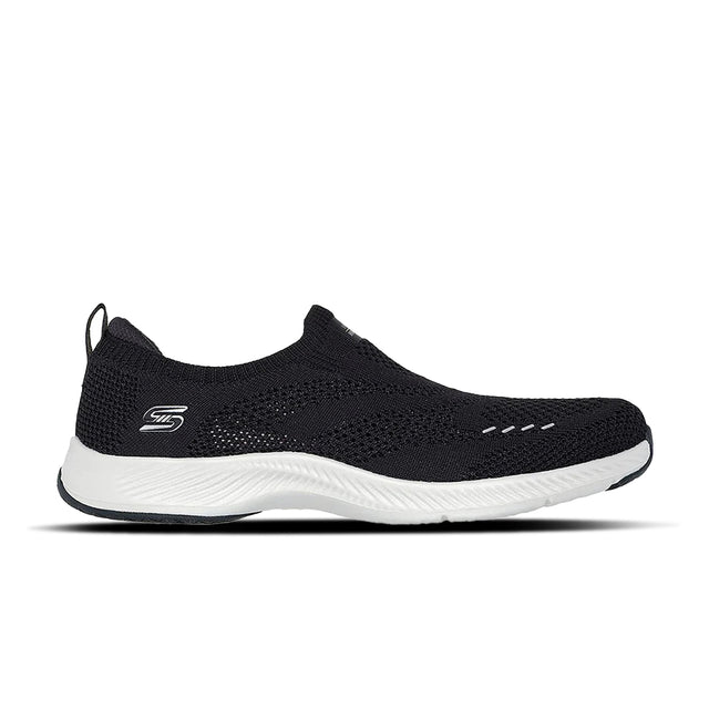 Black slip-on sneaker with white sole on a white background