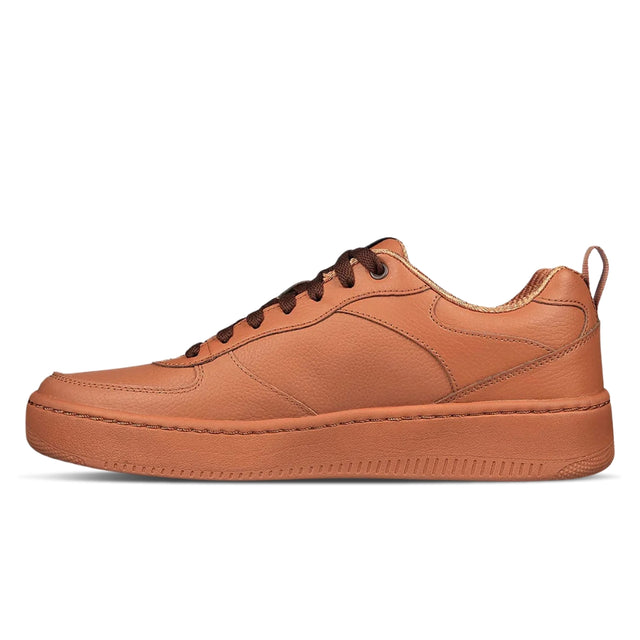 Brown leather sneaker on a white background