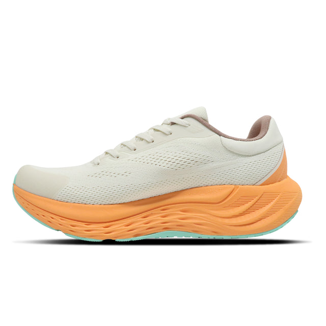 White running shoe with orange sole on a white background