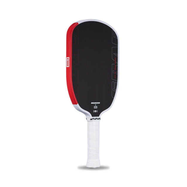 Pickleball paddle with black face and red edges on a white background