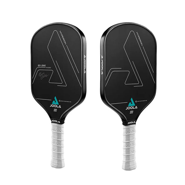 Two black pickleball paddles with gray handles on a white background