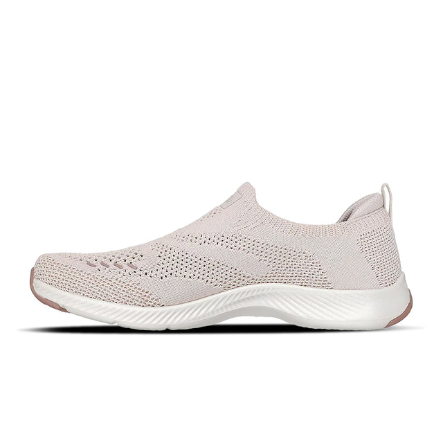 Light pink slip-on sneaker on a white background