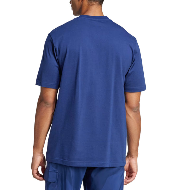 Person wearing a blue t-shirt and pants on a white background