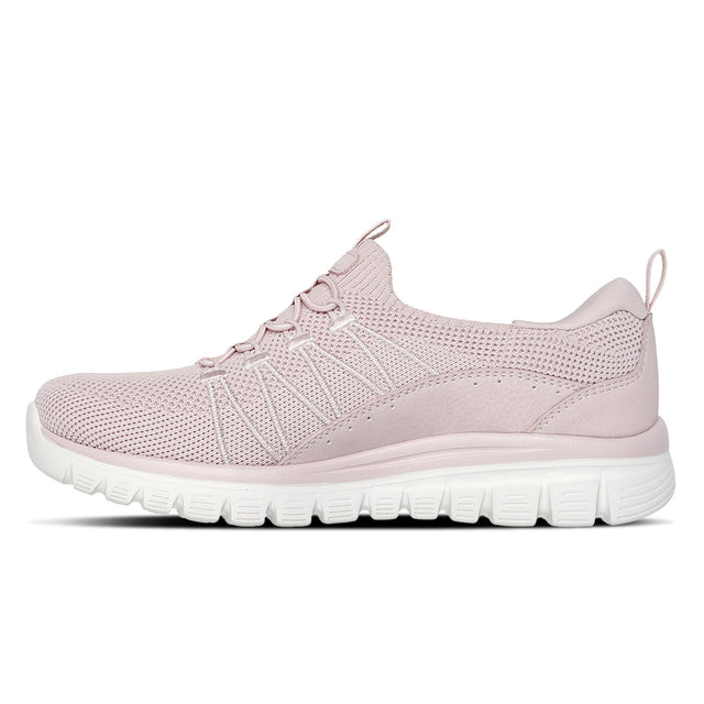 Pink sneaker with white sole on a white background