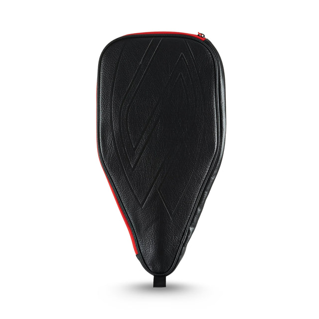 Black pickleball paddle with red accents on a white background