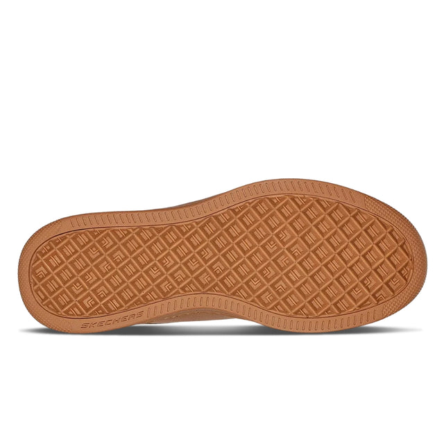 Brown shoe sole with textured pattern on a white background