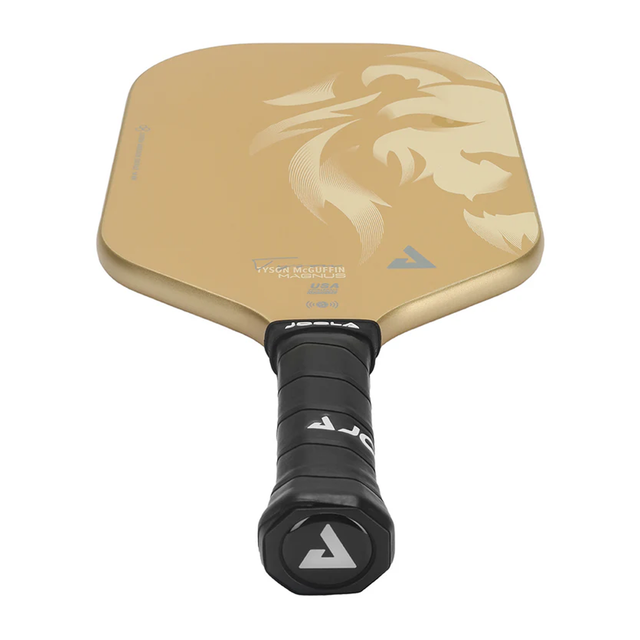 Gold pickleball paddle with black handle on a white background
