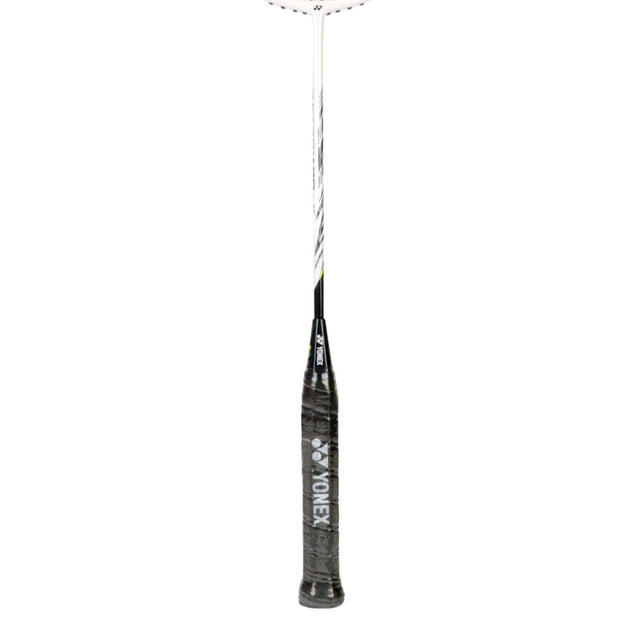 Unstrung Yonex badminton racket with a black grip and a silver frame.