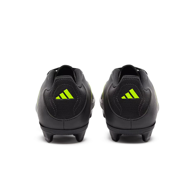 Black soccer cleats with yellow Adidas logo on a white background