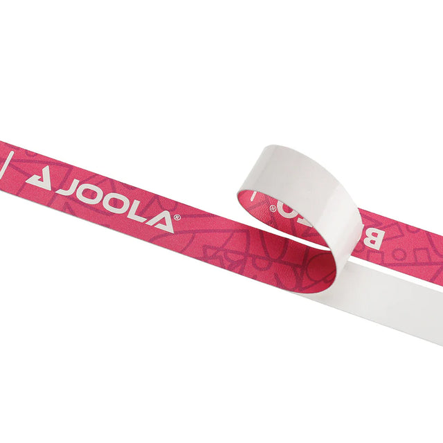 Pink and white sports tape with JOOLA branding on a white background
