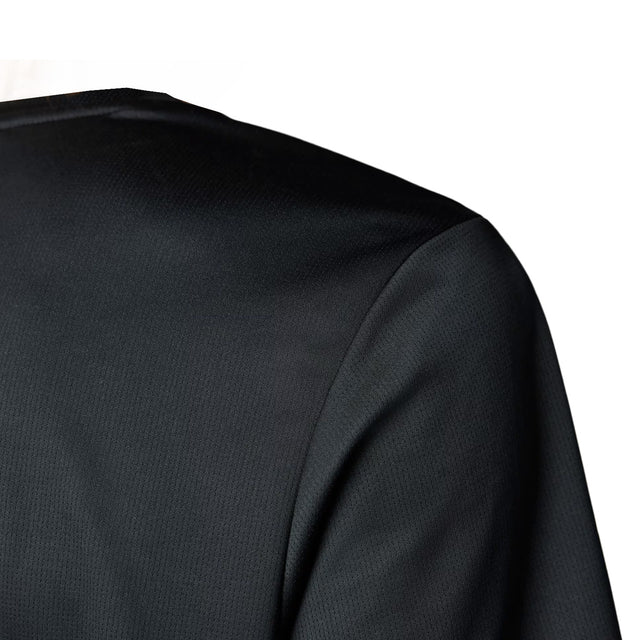 Close-up of a black fabric texture on a white background