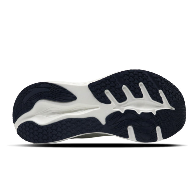 Navy and white athletic shoe sole on a white background