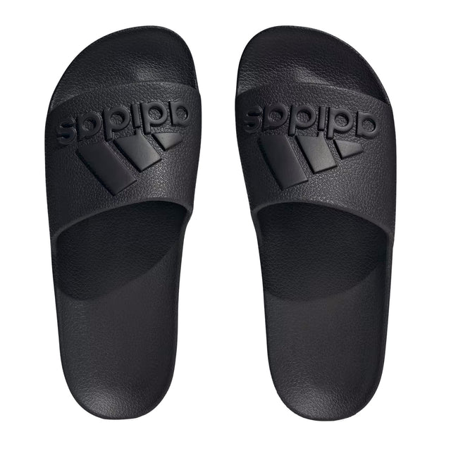 A pair of black adidas Adilette Aqua slippers with a streamlined silhouette and a molded EVA footbed.