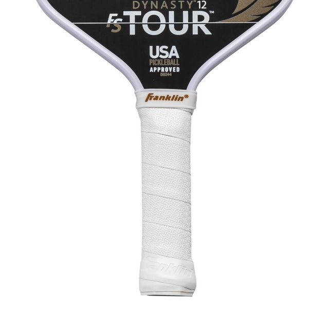 Close-up of a pickleball paddle with 'Franklin' branding on a white background