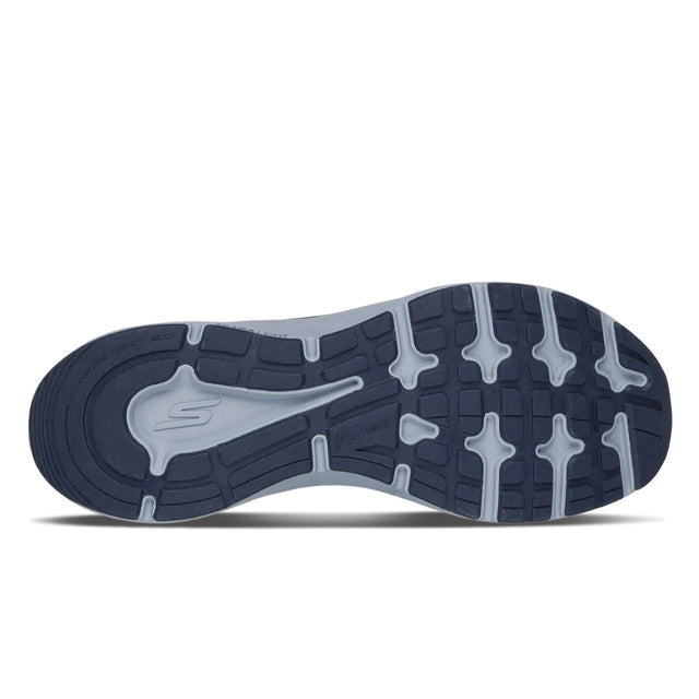 Sole of a sneaker with a brand logo on a white background