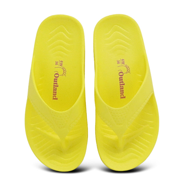 Yellow shoe insoles with 'Outland' branding on a white background