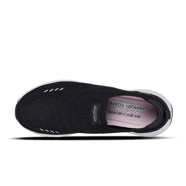 Black shoe with 'Memory Foam' label on a white background