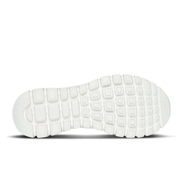 White shoe sole with textured pattern on a white background