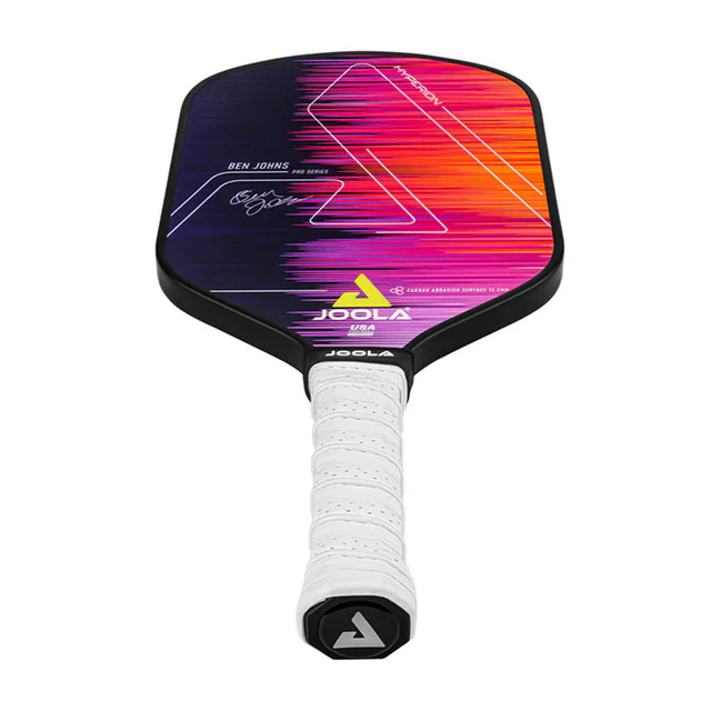 Colorful pickleball paddle with Joola branding on a white background