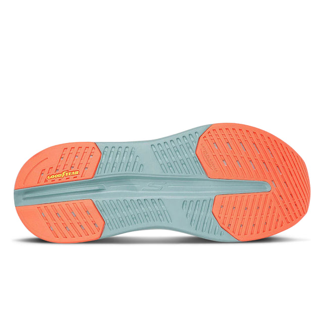 Close-up of a shoe sole with orange and gray design on a white background