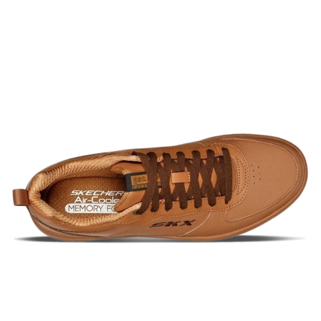 Brown sneaker with visible Skechers branding on a white background