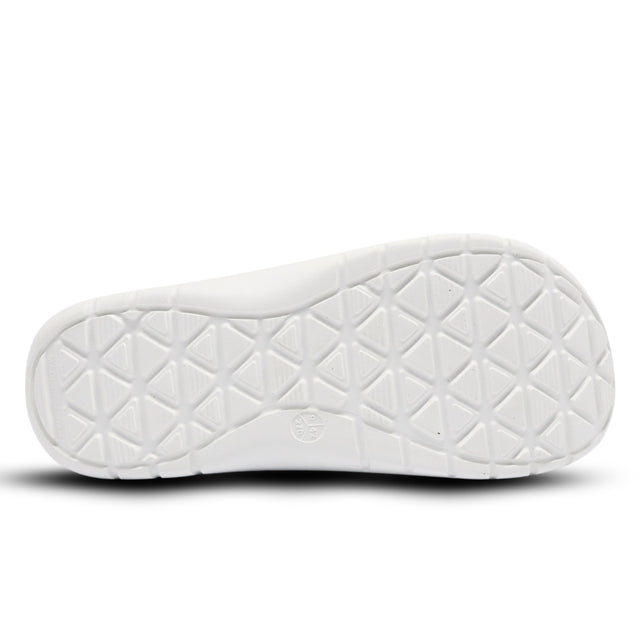 White quilted sole of a shoe on a white background