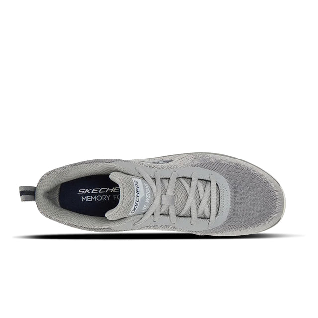 Gray sneaker with 'Skechers' branding on a white background