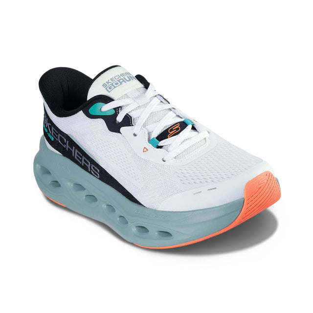 White running shoe with orange sole and blue sole on a white background