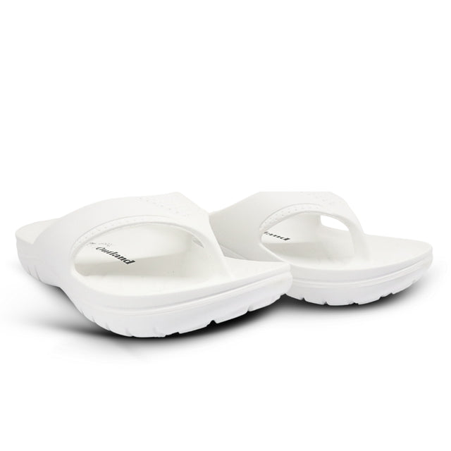 Pair of white sandals on a white background