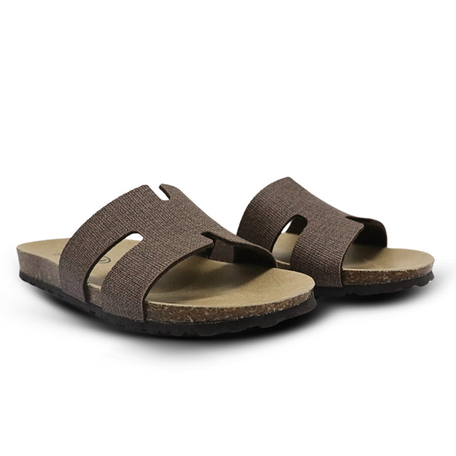 Pair of brown sandals on a white background