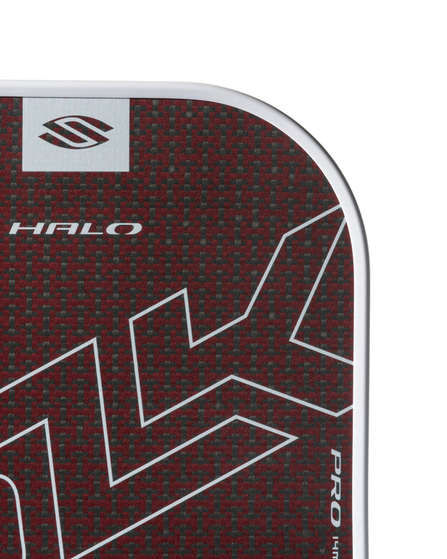 Close-up of a red sports equipment with 'HALO' branding on a white background