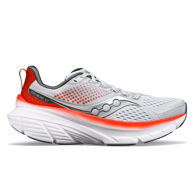 A Saucony Guide 17 running shoe with a white base color, featuring orange and gray accents and a distinctive design.