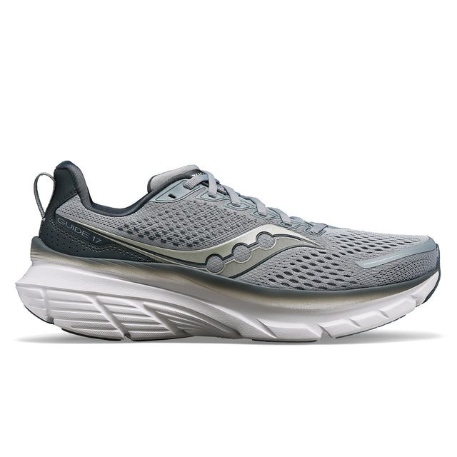 A pair of Saucony Guide 17 running shoes in gray color, featuring a wide fit and high sidewalls.