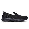 A black Skechers GO WALK 7 Daley 2 slip-on shoe with a mesh upper and a stable sole design.