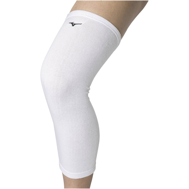 A white Mizuno leg sleeve worn on the left leg, providing compression and protection against scratches.
