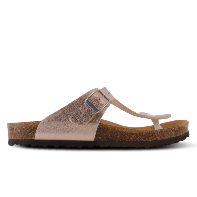 A rosegold sandal with an adjustable buckle strap and a flat sole made of microfiber and leather, on a white background.