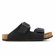 A black Outland Delaware sandal with two straps and a cork sole.