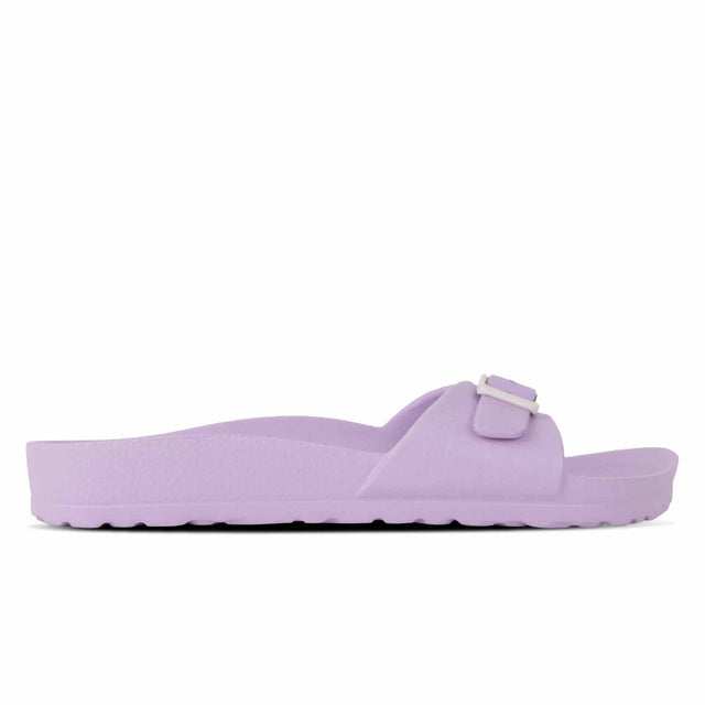 A single lavender-colored Outland sandal for women, featuring a buckle strap and a flat sole.