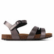 A metallic gray Outland Perth sandal with microfiber upper and leather lining, featuring an ankle strap and a cork-like sole.