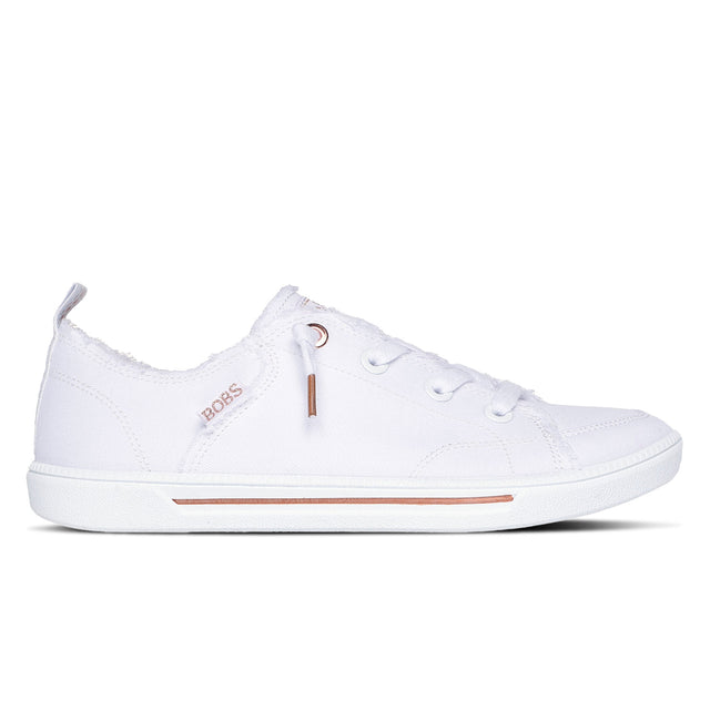 White sneaker with a subtle brown line on a white background
