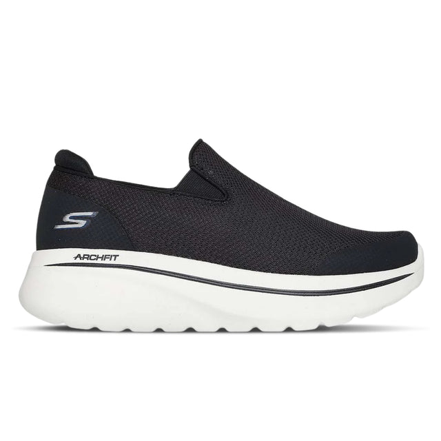 Black slip-on shoe with white sole on a white background
