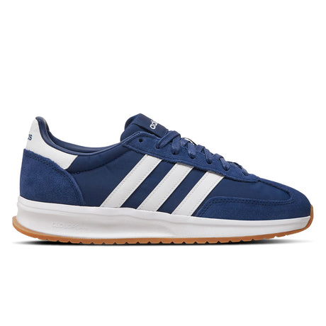 Blue Adidas sneaker with white stripes on a white background