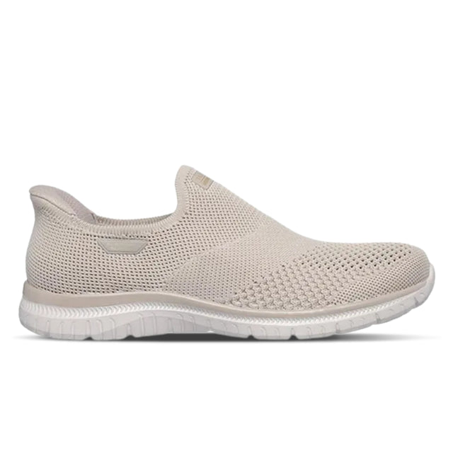 Beige slip-on shoe on a white background