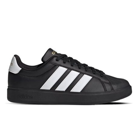 Black Adidas sneaker with white stripes on a white background